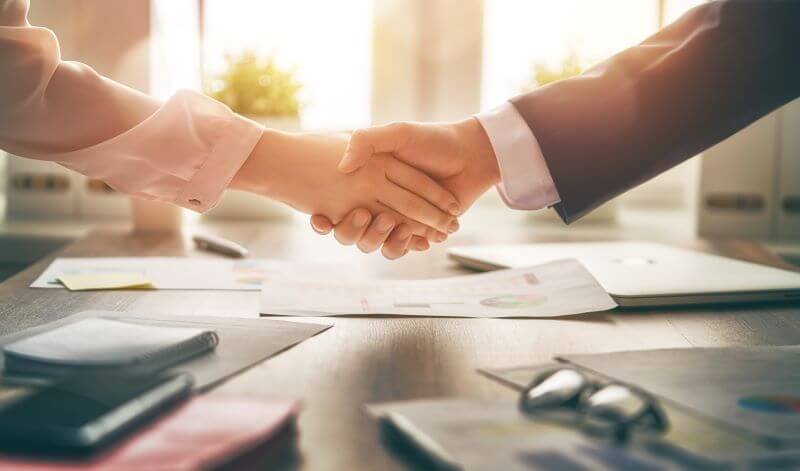 Shaking Hands for Exclusive Right to Rent Agreement